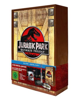 Trilogía Jurassic Park en caja de madera con regalos