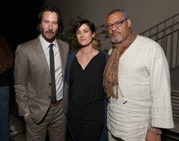 Imagen: (Neo, Trinity y Morfeo Reunidos en la Premier de JOHN WICK 2). 