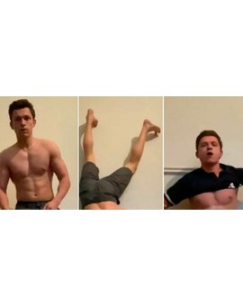 "Tom Holland" Se pone una camiseta haciendo el pino. 