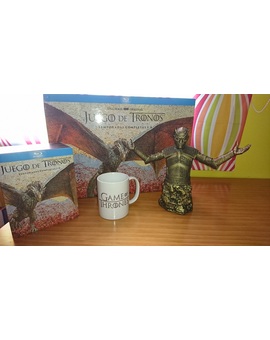 Juego de tronos pack de temporadas más la figura!! :-D
