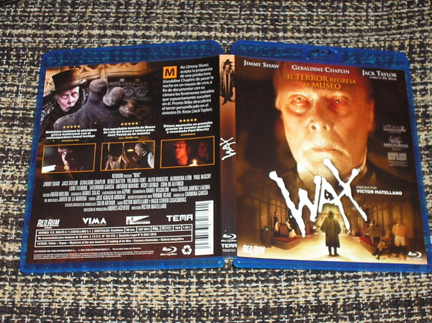 "Wax" caratula reversible.