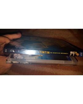 Slipcover Tintin despegado: ¿que tipo de pegamento me aconsejáis utilizar para pegarlo?