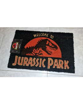 Bienvenidos a Jurassic Park. Felpudo. Mi Compra 13-09-2026.