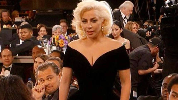 Curiosidades de la Gala de los Globos de Oro: Parece que a Di Caprio no le hace mucha gracia la presencia de Lady Gaga. XD